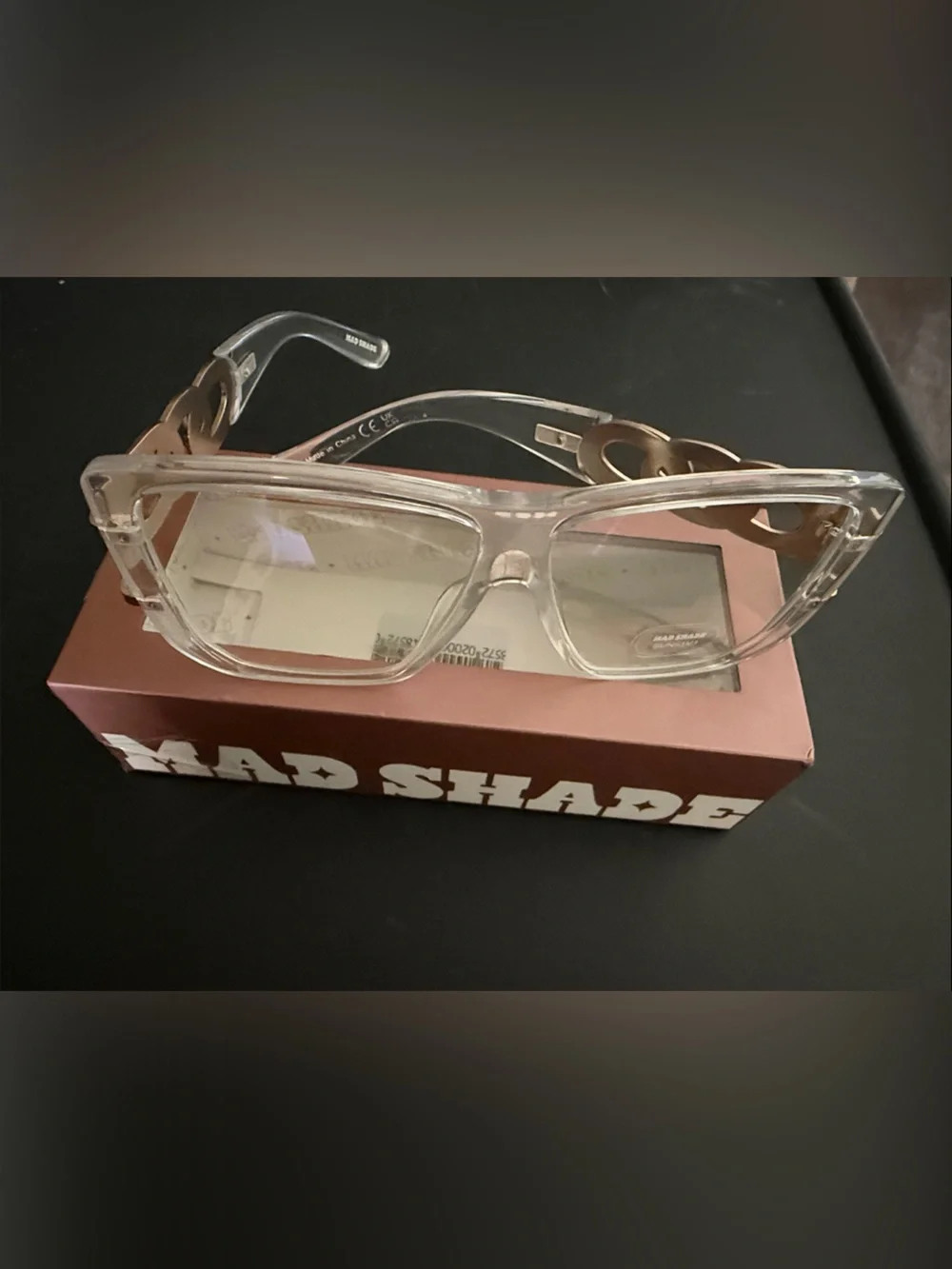 Mad Shade Clear Frame Sunglasses with Gold Chain Accent